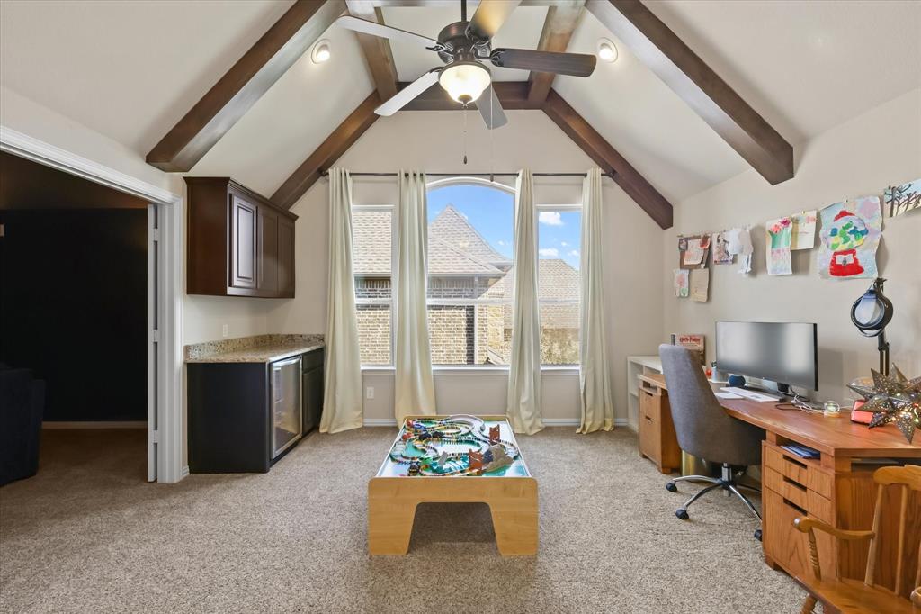 14006 Stars Road Frisco, TX 75035 - Photo 20 of 38 a living room with furniture and a kitchen view