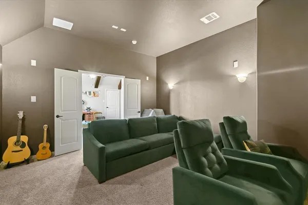 a living room with furniture and a couch