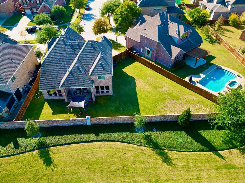 14006 Stars Road Frisco, TX 75035 - Photo 37 of 38 swimming pool view with a garden and plants