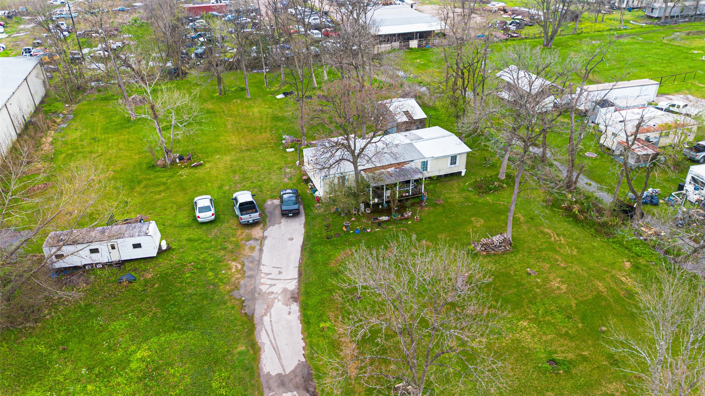 13423 Chrisman Road Houston, TX 77039 - Photo 2 of 18 a aerial view of a house with a yard basket ball court and outdoor seating