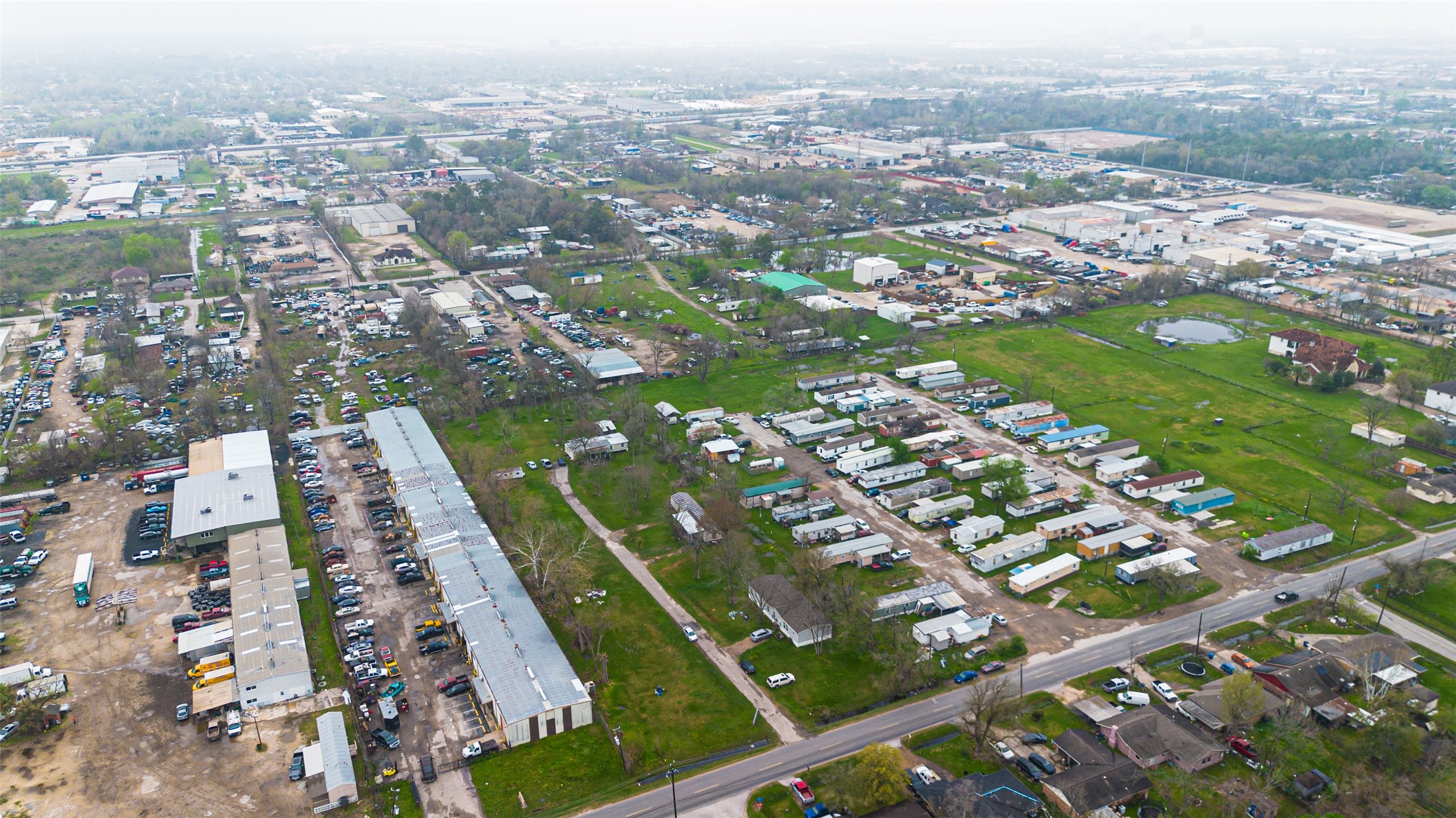 13423 Chrisman Road Houston, TX 77039 - Photo 10 of 18 an aerial view of city and lake