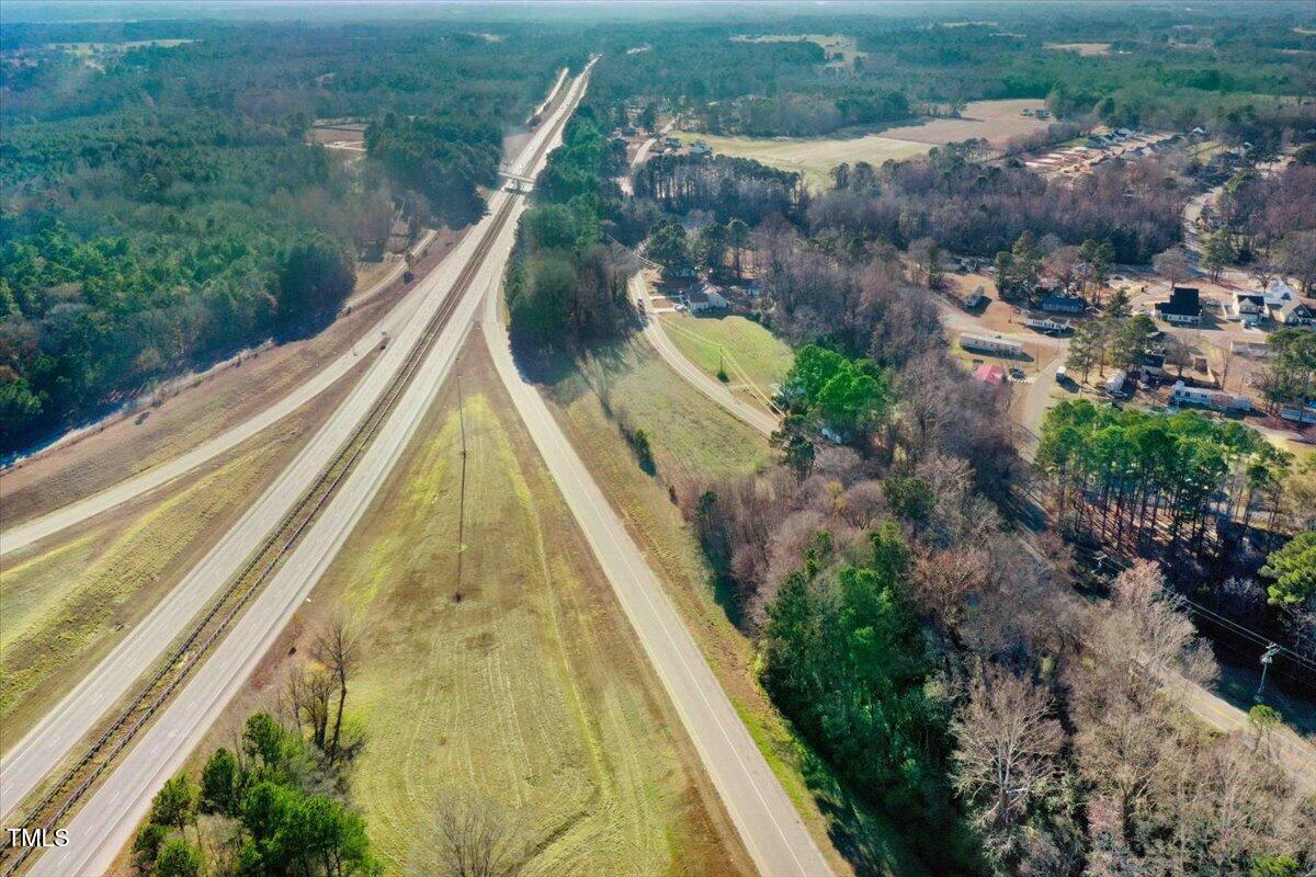 0 Allendale Road Four Oaks, NC 27524 - Photo 13 of 13 a view of swimming pool with a garden and lake view