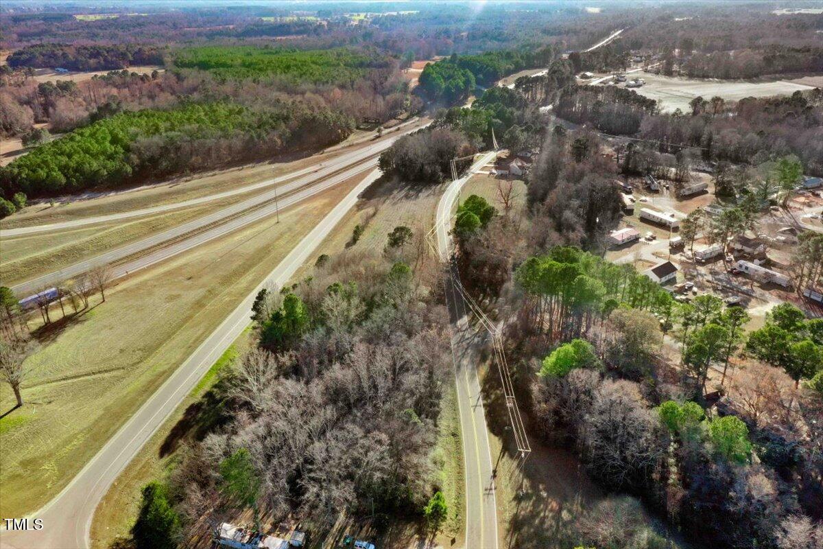 0 Allendale Road Four Oaks, NC 27524 - Photo 10 of 13 a view of a yard with flower plants