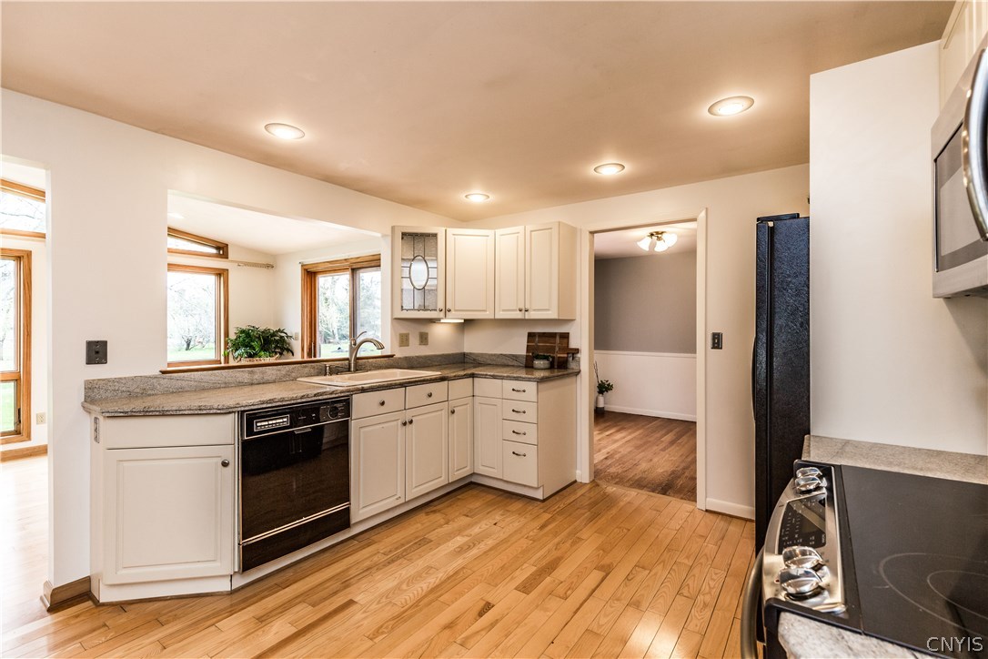 4546 Limestone Drive Manlius, NY 13104 - Photo 12 of 50 The kitchen looks out to the greatroom addition!