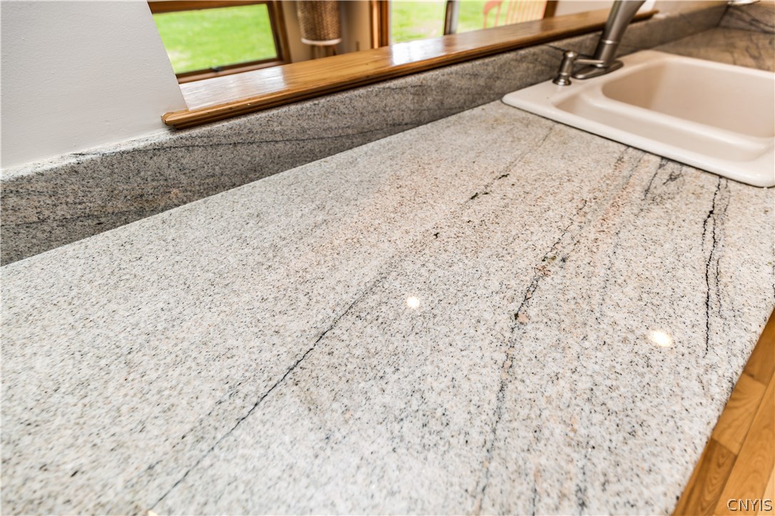 4546 Limestone Drive Manlius, NY 13104 - Photo 13 of 50 Beautiful grain in the granite counters!