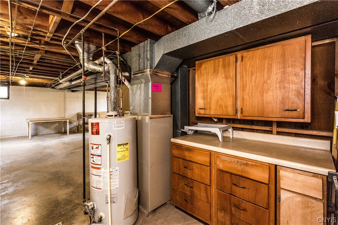 4546 Limestone Drive Manlius, NY 13104 - Photo 41 of 50 Across from the laundry area is this handy folding