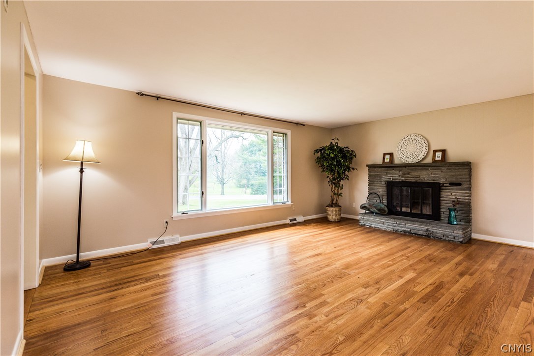 4546 Limestone Drive Manlius, NY 13104 - Photo 5 of 50 Plenty of natural light in this Field stone hearth