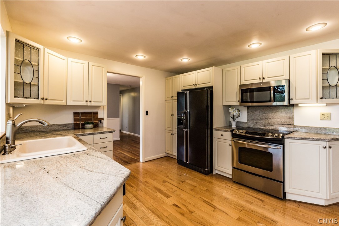 4546 Limestone Drive Manlius, NY 13104 - Photo 9 of 50 Beautifully laid out kitchen has gorgeous granite