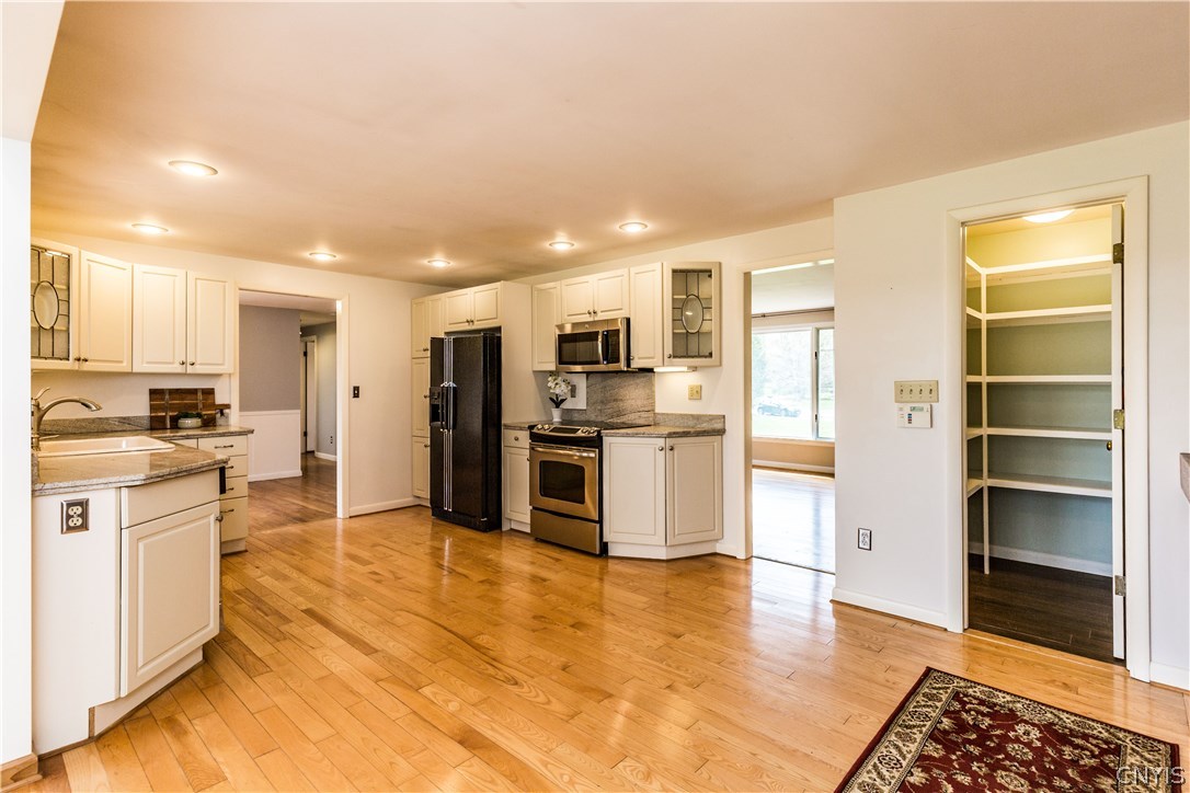 4546 Limestone Drive Manlius, NY 13104 - Photo 10 of 50 The kitchen is complete with a walk-in pantry!