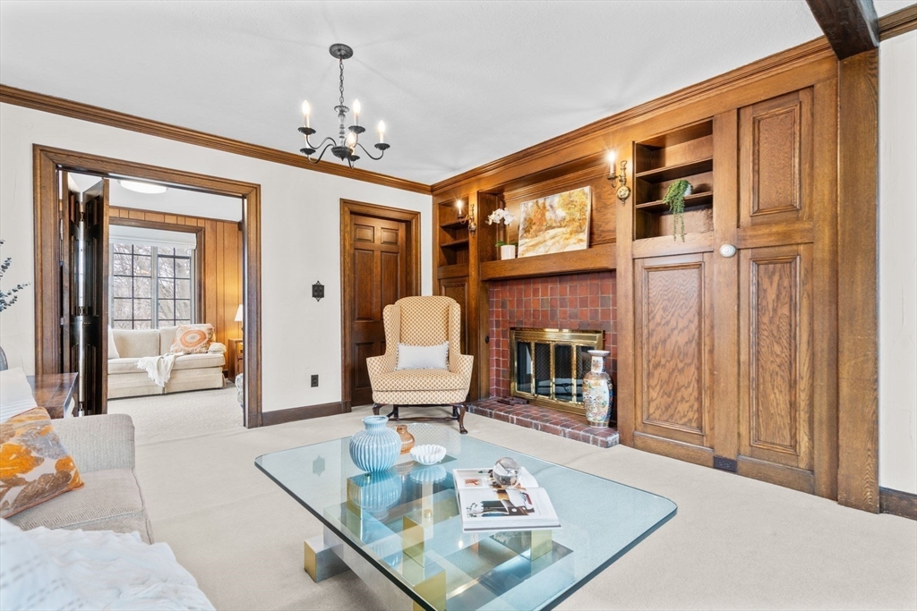 30 Pine Ridge Road Medford, MA 02155 - Photo 11 of 42 a living room with furniture chandelier and a table