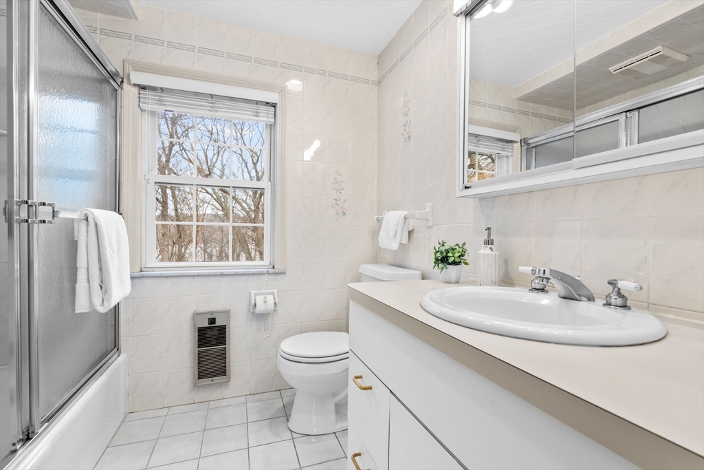 30 Pine Ridge Road Medford, MA 02155 - Photo 24 of 42 a bathroom with a sink toilet and shower