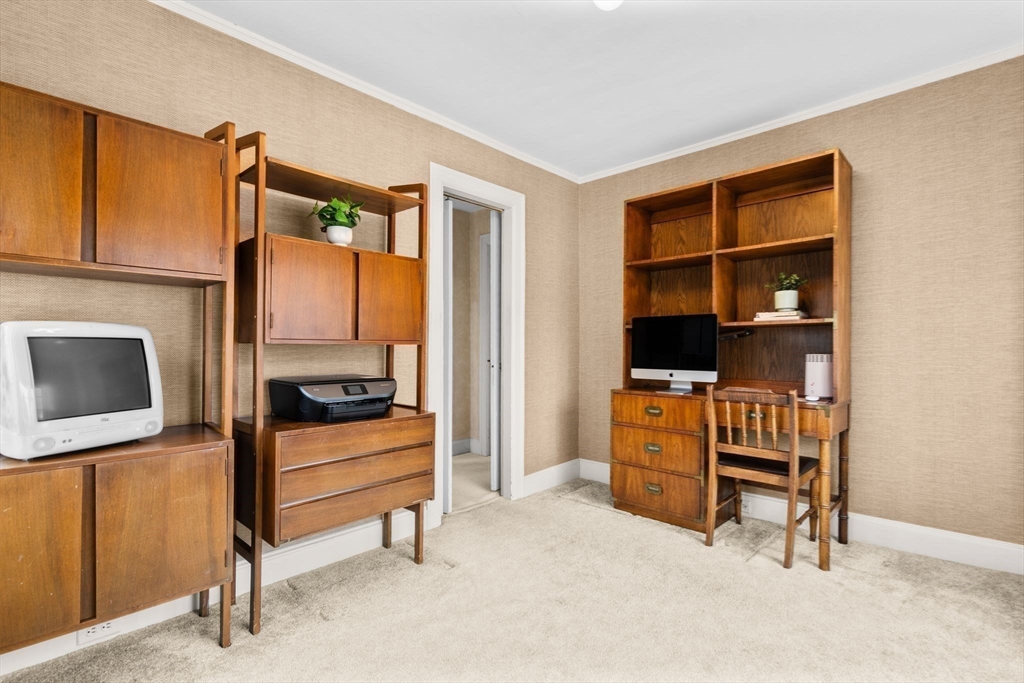 30 Pine Ridge Road Medford, MA 02155 - Photo 27 of 42 a room with furniture and a flat screen tv