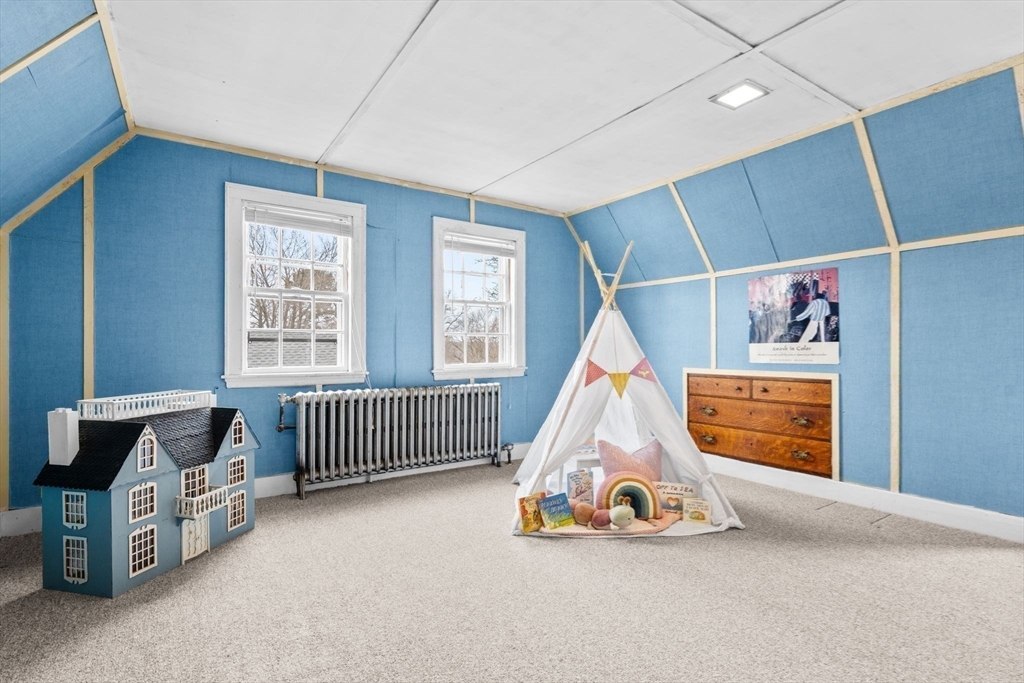 30 Pine Ridge Road Medford, MA 02155 - Photo 34 of 42 a bedroom with furniture and windows