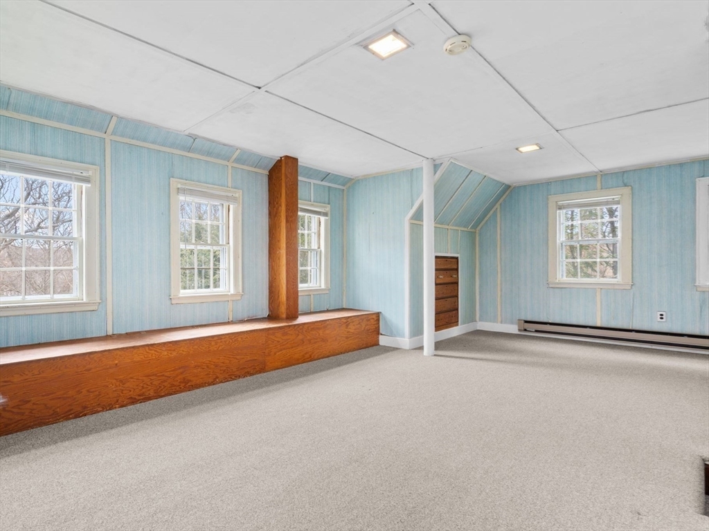 30 Pine Ridge Road Medford, MA 02155 - Photo 35 of 42 an empty room with windows