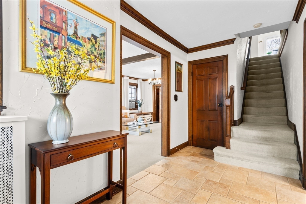 30 Pine Ridge Road Medford, MA 02155 - Photo 5 of 42 a view of entryway with wooden floor