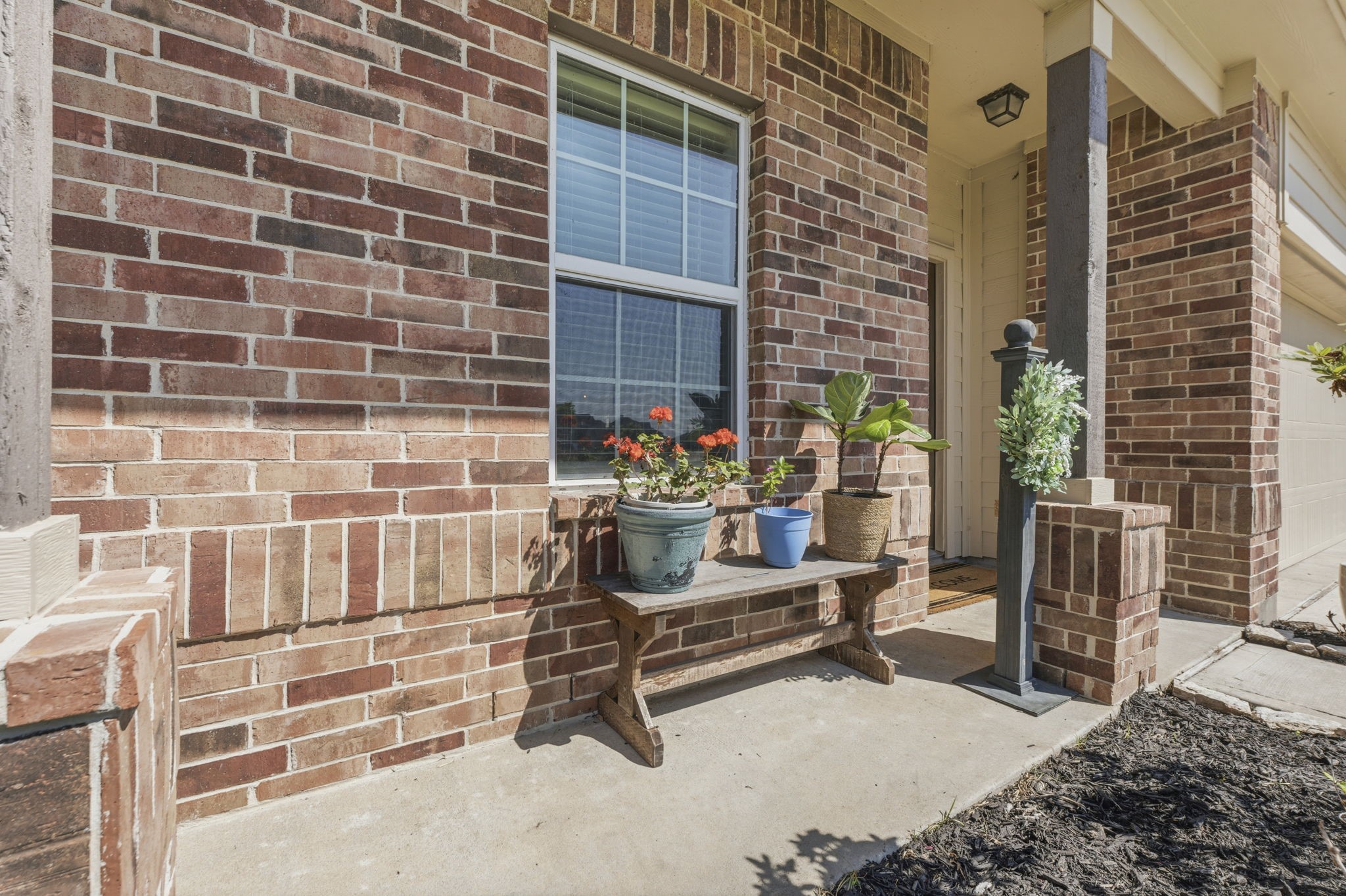 2401 Abbot Brk Drive Rosharon, TX 77583 - Photo 5 of 50 The charming front porch offers the perfect setting for a bistro table and chairs or a porch swing, creating an ideal spot to unwind with morning coffee or enjoy a relaxing evening glass of sweet tea.