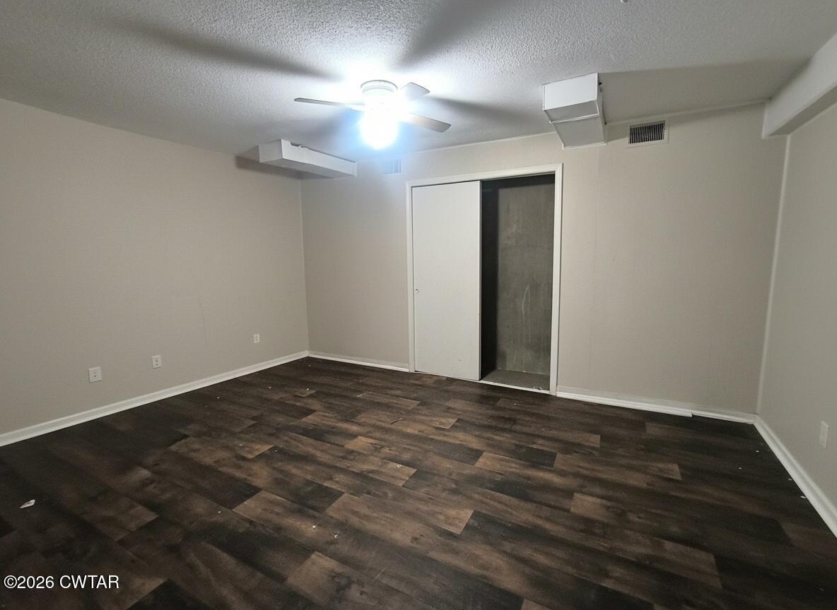 513 Viar Road Dyersburg, TN 38024 - Photo 32 of 37 a view of an empty room with a chandelier fan