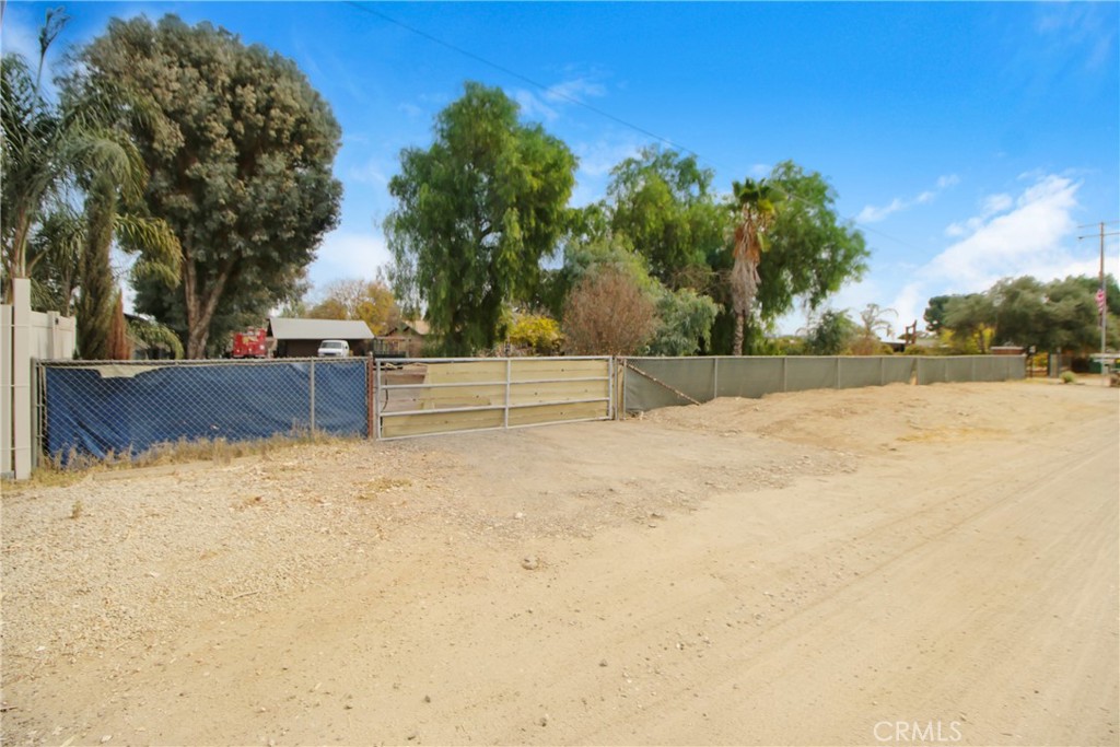 30640 Old Windmill Road Menifee, CA 92584 - Photo 14 of 14 a view of a yard covered with snow in the background