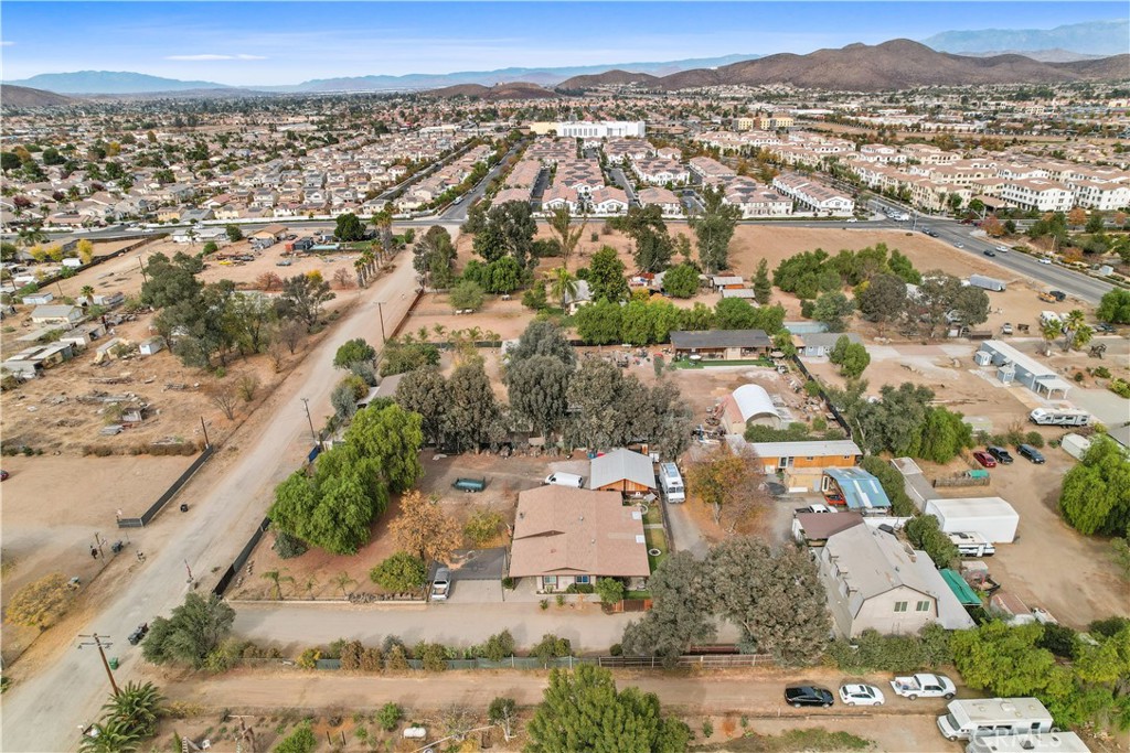 30640 Old Windmill Road Menifee, CA 92584 - Photo 2 of 14 an aerial view of residential houses with outdoor space
