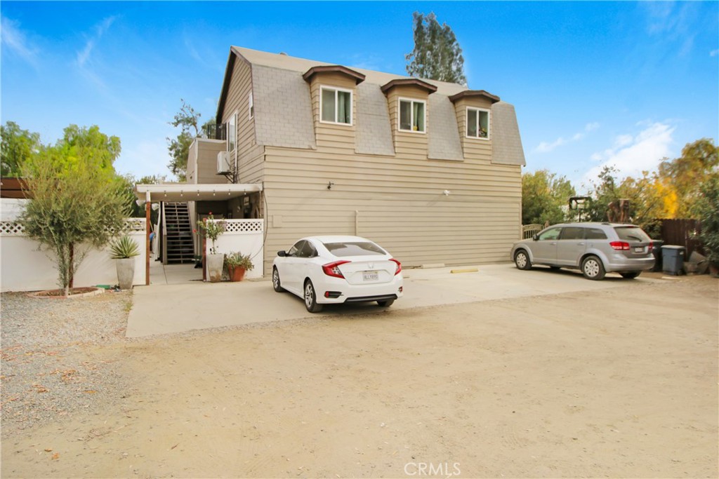 30640 Old Windmill Road Menifee, CA 92584 - Photo 7 of 14 a car parked in front of a house