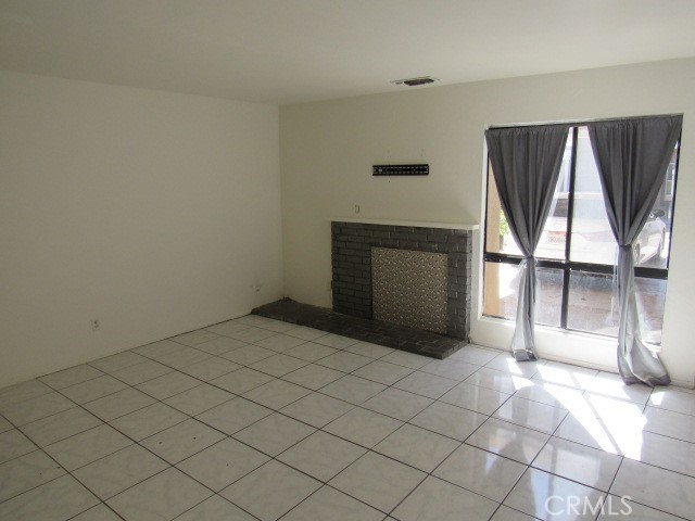 44583 La Paz Road Temecula, CA 92592 - Photo 4 of 32 front room & fireplace