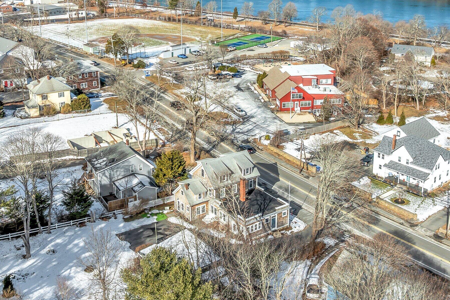 896 Sandwich Road Sagamore, MA 02561 - Photo 28 of 32 a city view with residential buildings and wooden fence