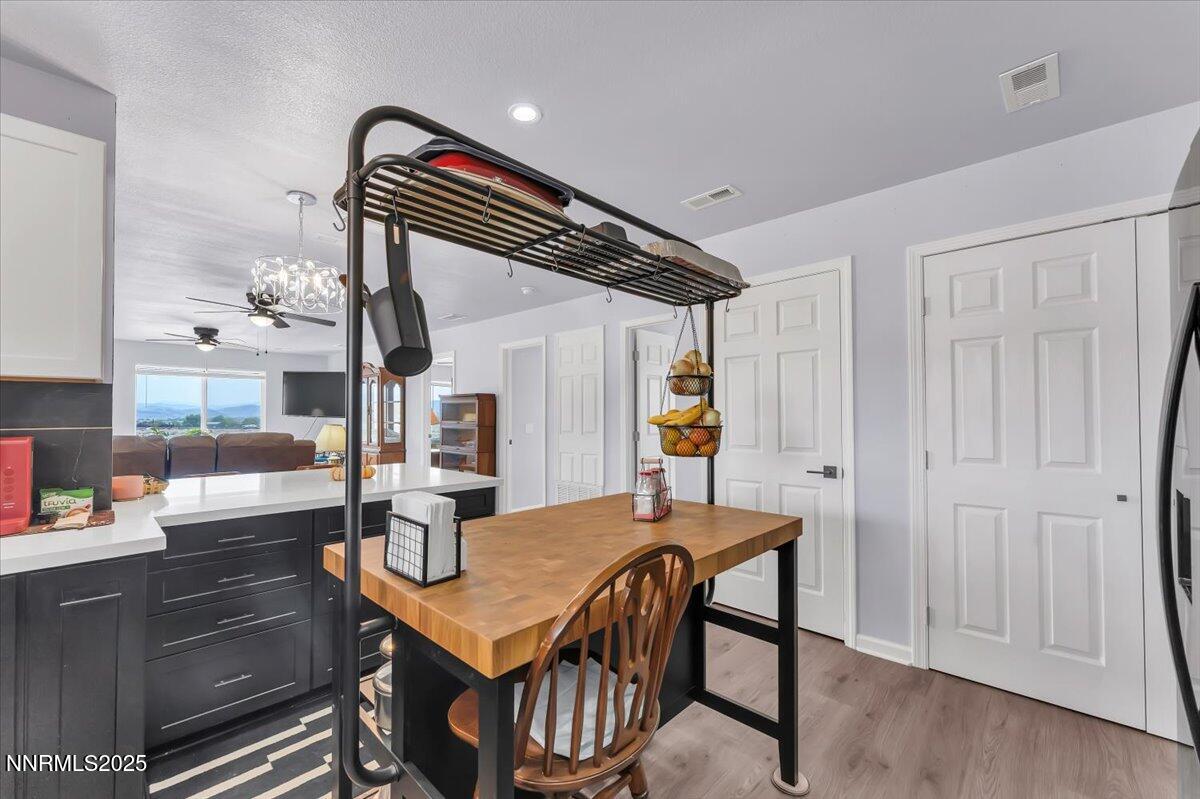 4895 Cheyenne Trail Stagecoach, NV 89429 - Photo 12 of 52 a view of a dining room with furniture