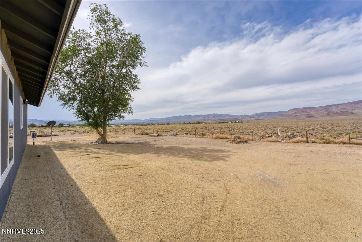 4895 Cheyenne Trail Stagecoach, NV 89429 - Photo 24 of 52 a view of an lake with a yard
