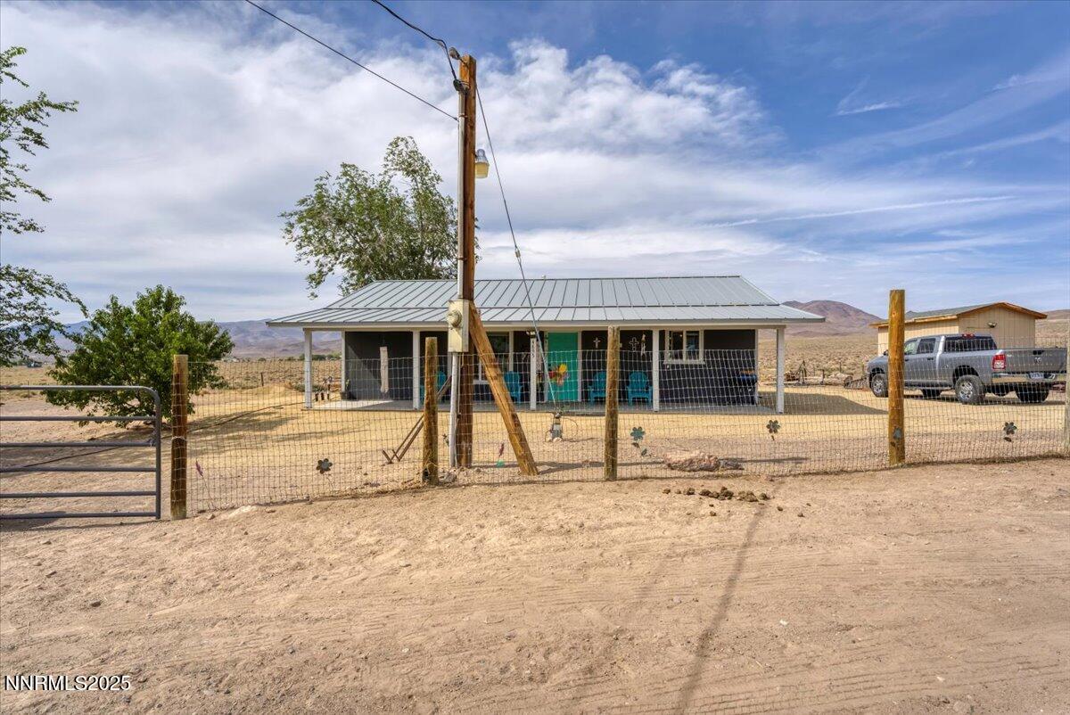 4895 Cheyenne Trail Stagecoach, NV 89429 - Photo 45 of 52 a house view with a backyard space