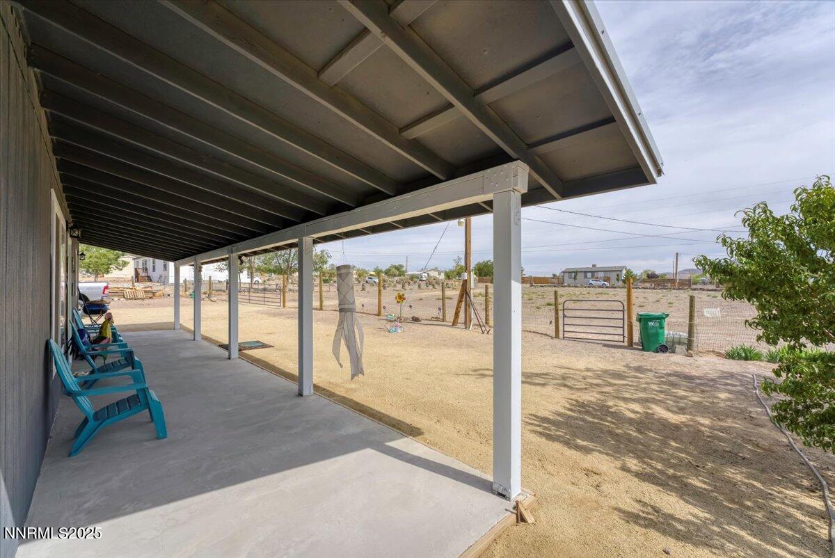 4895 Cheyenne Trail Stagecoach, NV 89429 - Photo 49 of 52 a porch with view of outdoor space