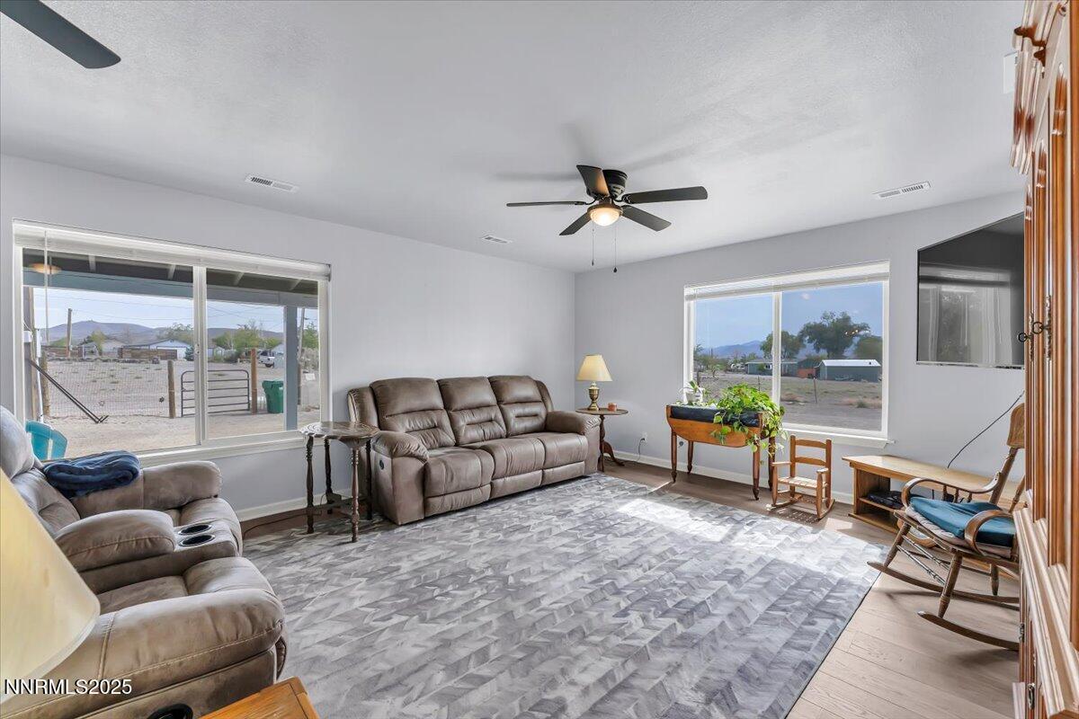 4895 Cheyenne Trail Stagecoach, NV 89429 - Photo 6 of 52 a living room with furniture and a window