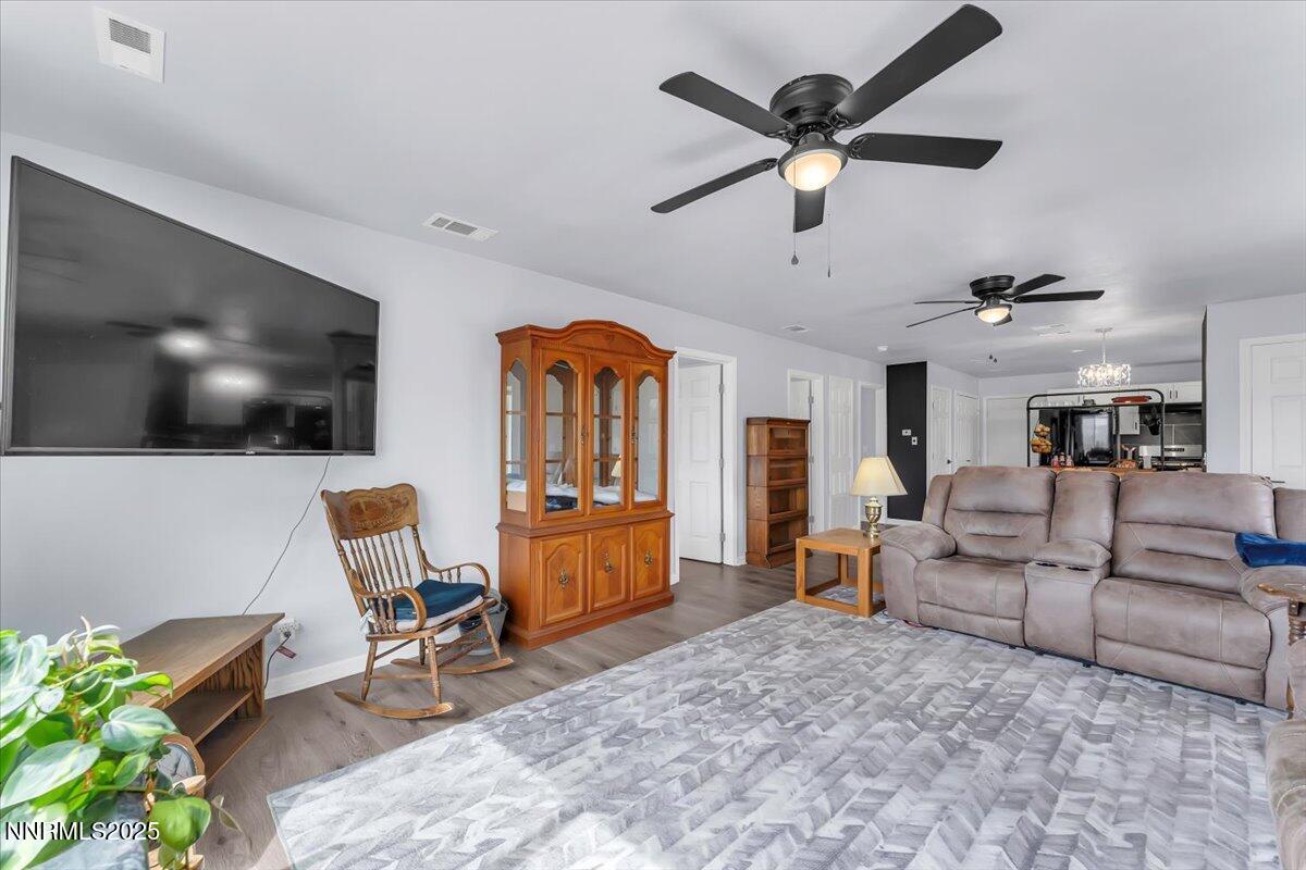 4895 Cheyenne Trail Stagecoach, NV 89429 - Photo 8 of 52 a living room with furniture and a flat screen tv
