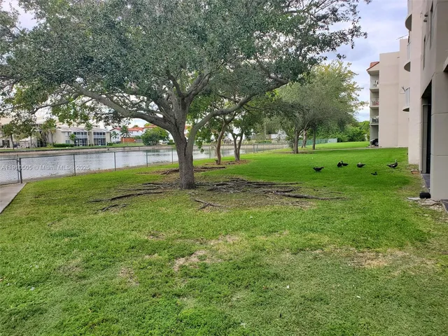 a view of backyard with green space