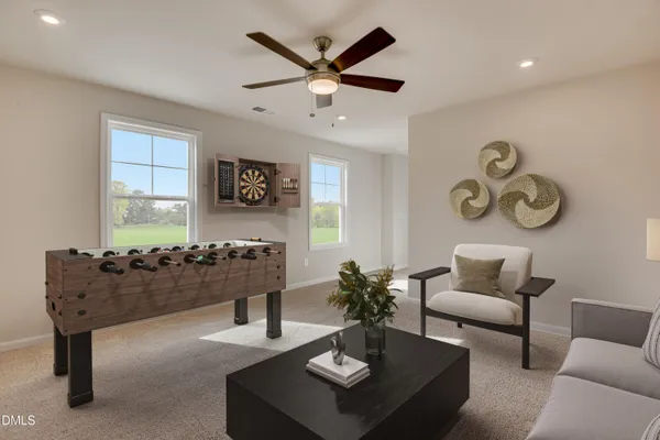 a living room with furniture and furniture