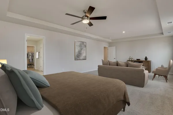 a bed room with bed and a couch