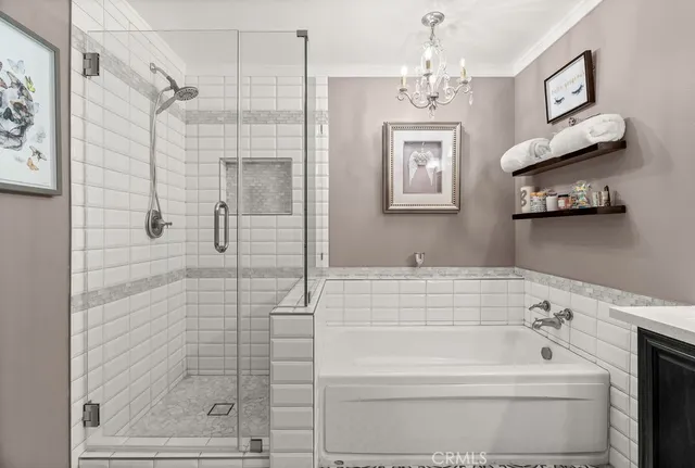 a spacious bathroom with a sink double vanity and a mirror