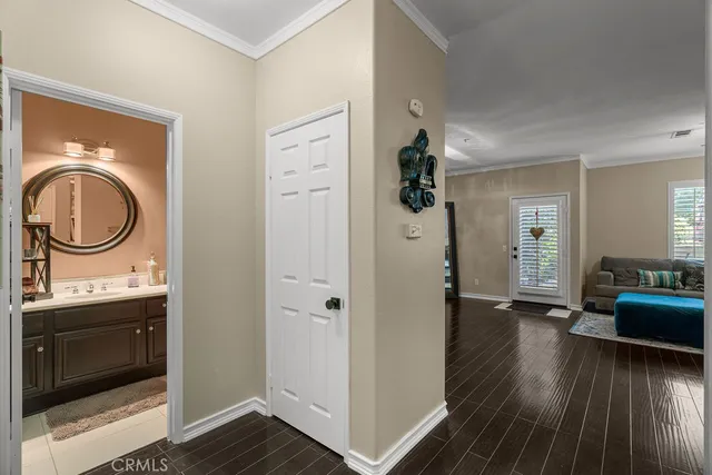 a view of a bedroom from a hallway