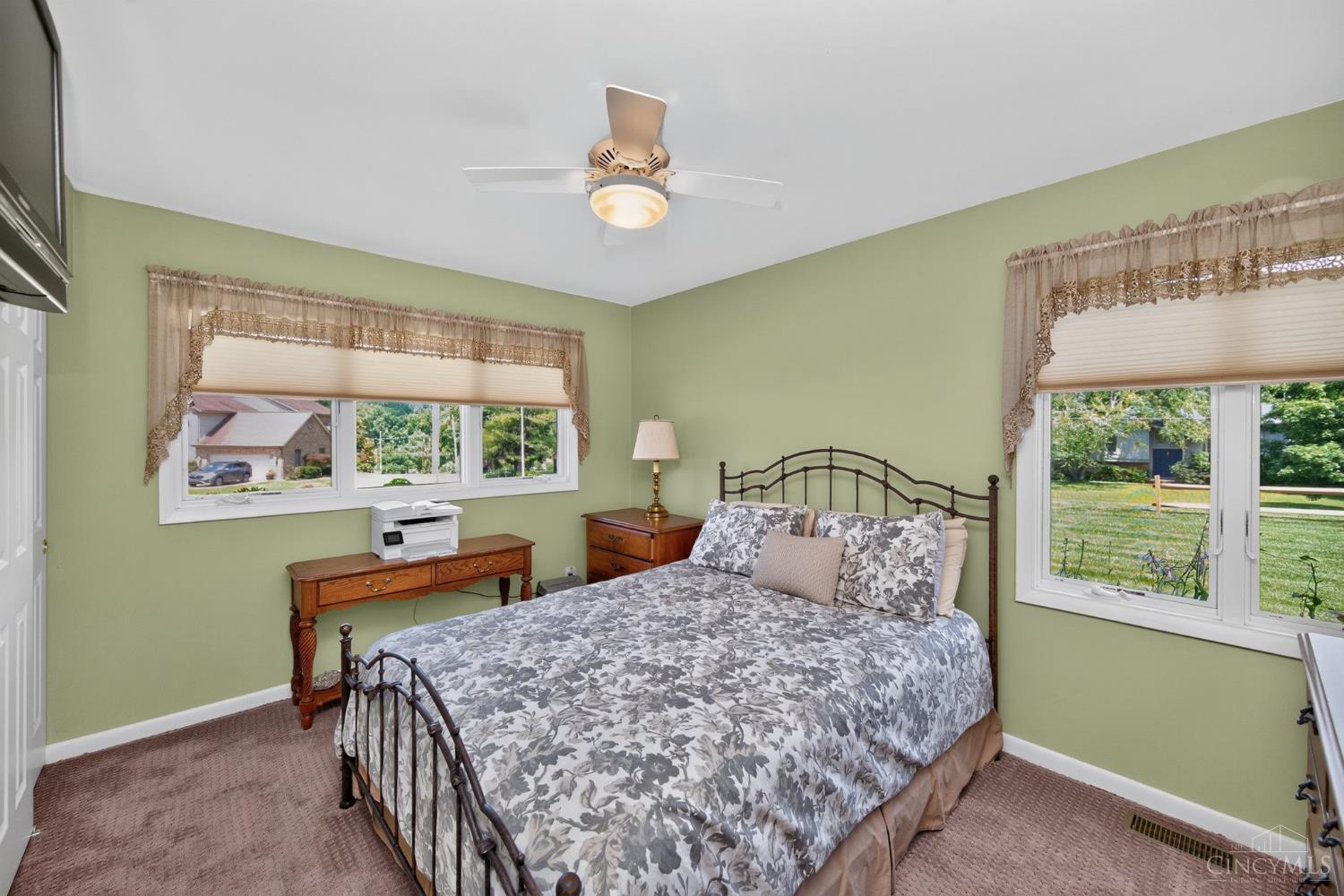 3078 Ebenezer Road Cincinnati, OH 45233 - Photo 29 of 51 The guest bedroom has a ceiling fan and beautiful Andersen windows.
