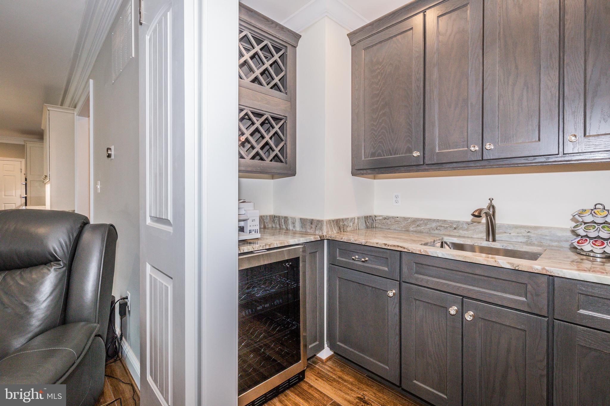 135 Church Road Arnold, MD 21012 - Photo 9 of 69 Wet bar complete with wine fridge