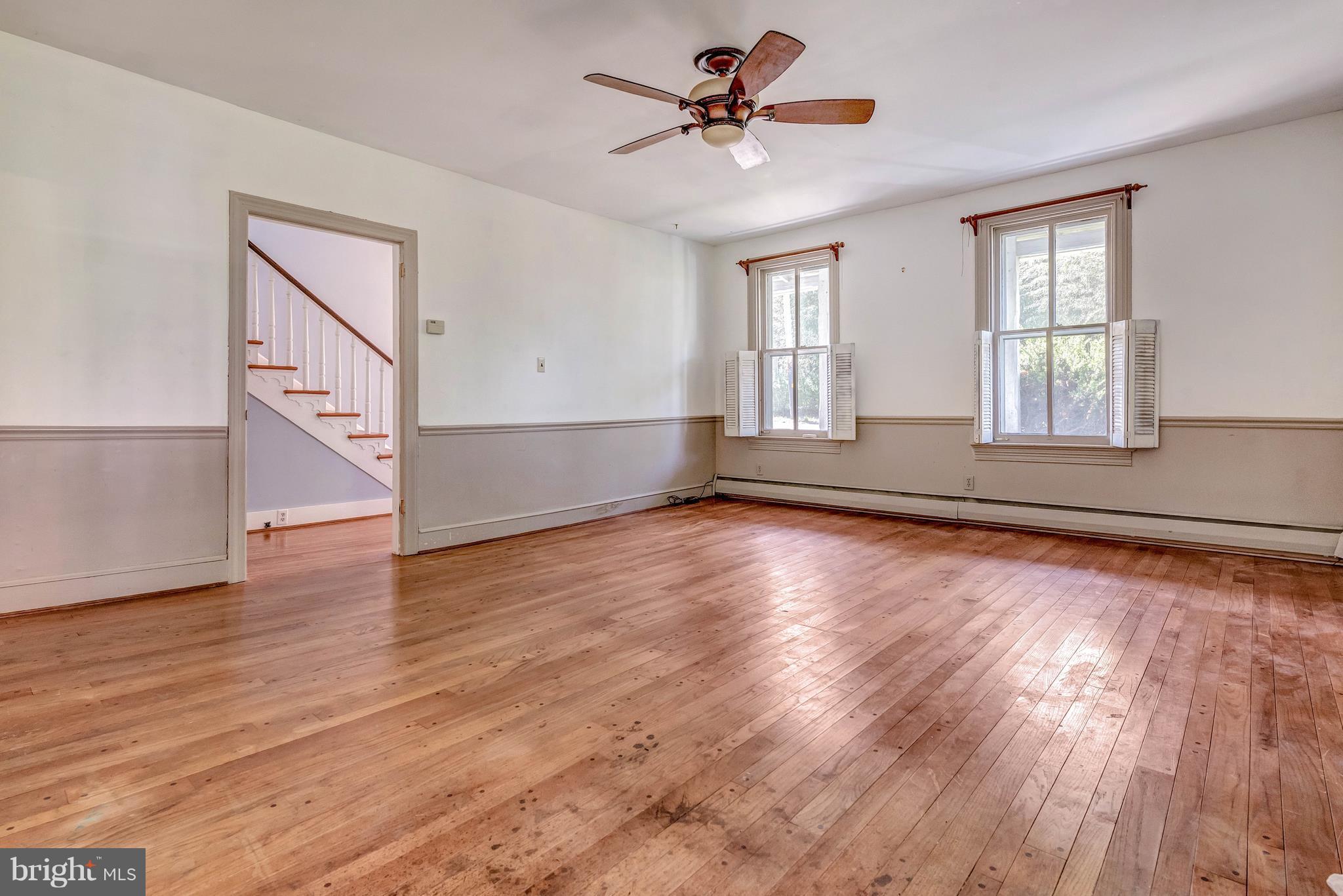 18031 Barnesville Road Barnesville, MD 20838 - Photo 21 of 30 Front living room. Vintage hardwoods everywhere!