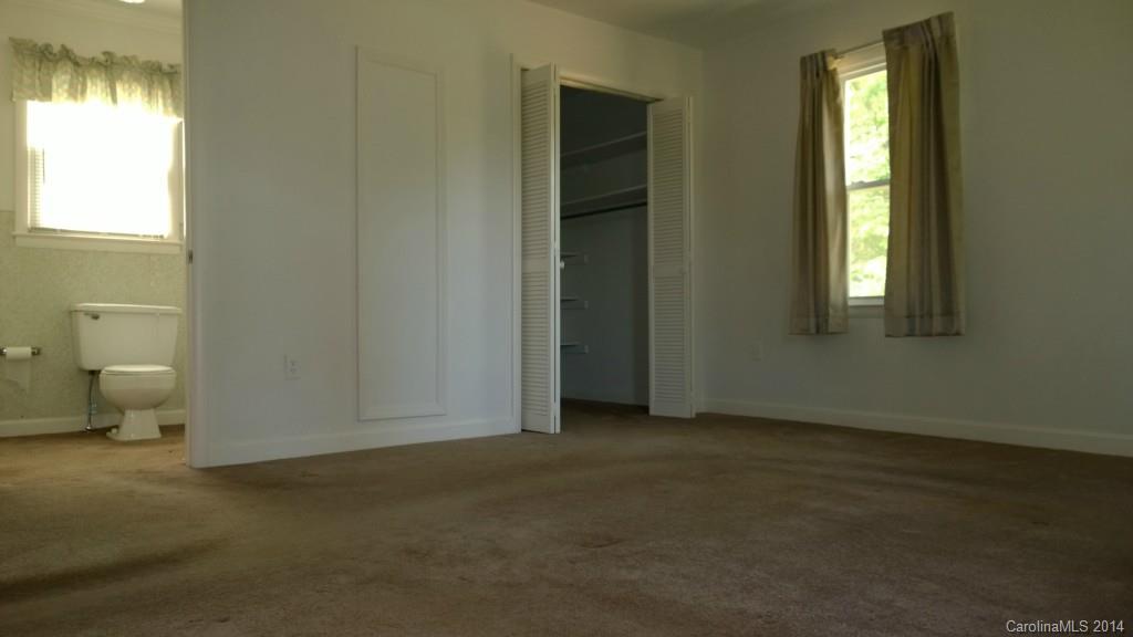 1709 Mayesville Road Morven, NC 28119 - Photo 12 of 21 a view of an empty room with a window