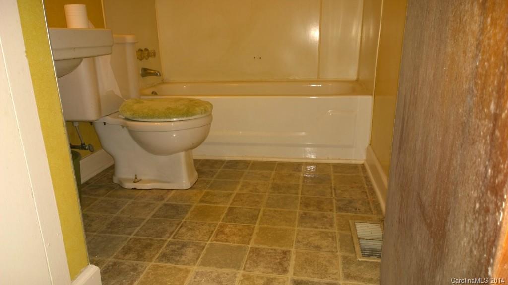 1709 Mayesville Road Morven, NC 28119 - Photo 18 of 21 a bathroom with a toilet and a shower