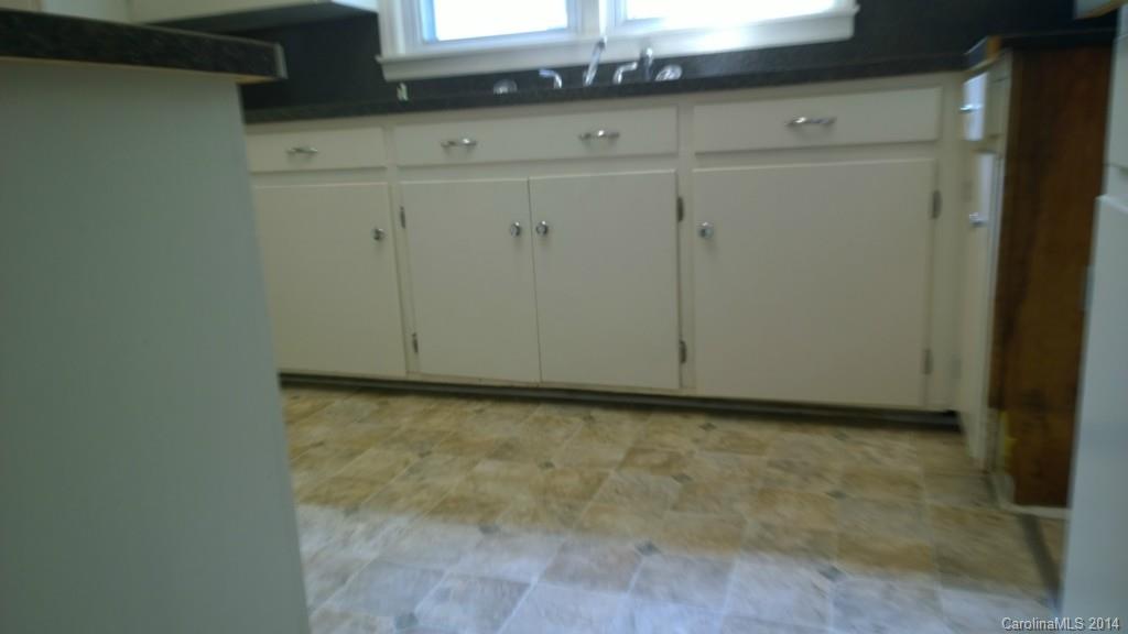 1709 Mayesville Road Morven, NC 28119 - Photo 6 of 21 a view of wooden cabinets