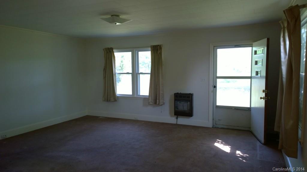 1709 Mayesville Road Morven, NC 28119 - Photo 8 of 21 an empty room with windows