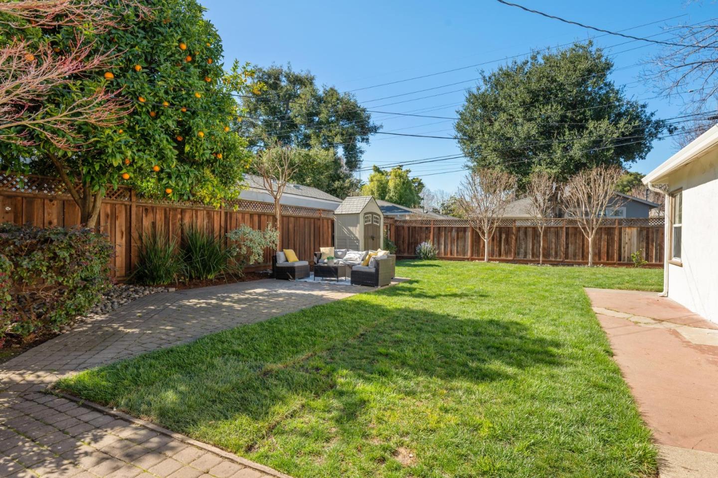 1035 Henderson Avenue Menlo Park, CA 94025 - Photo 13 of 38 a view of a house with backyard and sitting area