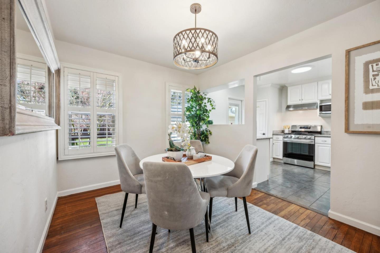 1035 Henderson Avenue Menlo Park, CA 94025 - Photo 16 of 38 a view of a dining room with furniture window and wooden floor