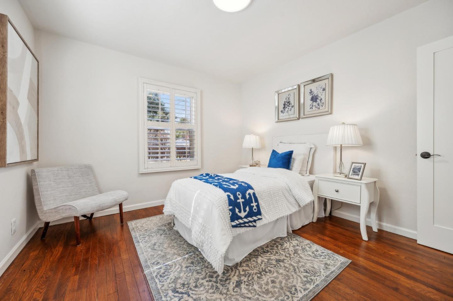 1035 Henderson Avenue Menlo Park, CA 94025 - Photo 20 of 38 a bed room with a bed and a chair