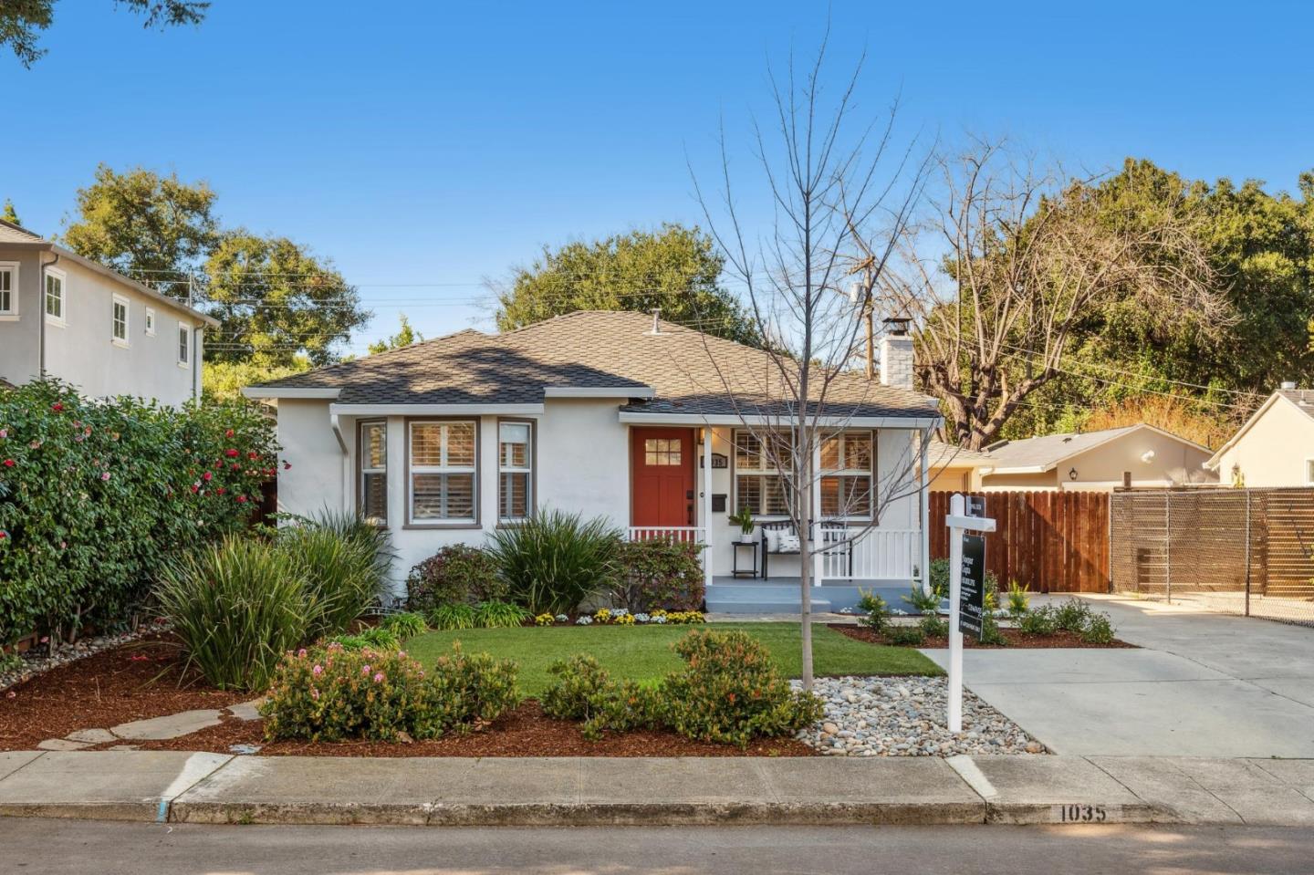 1035 Henderson Avenue Menlo Park, CA 94025 - Photo 23 of 38 a front view of a house with a garden