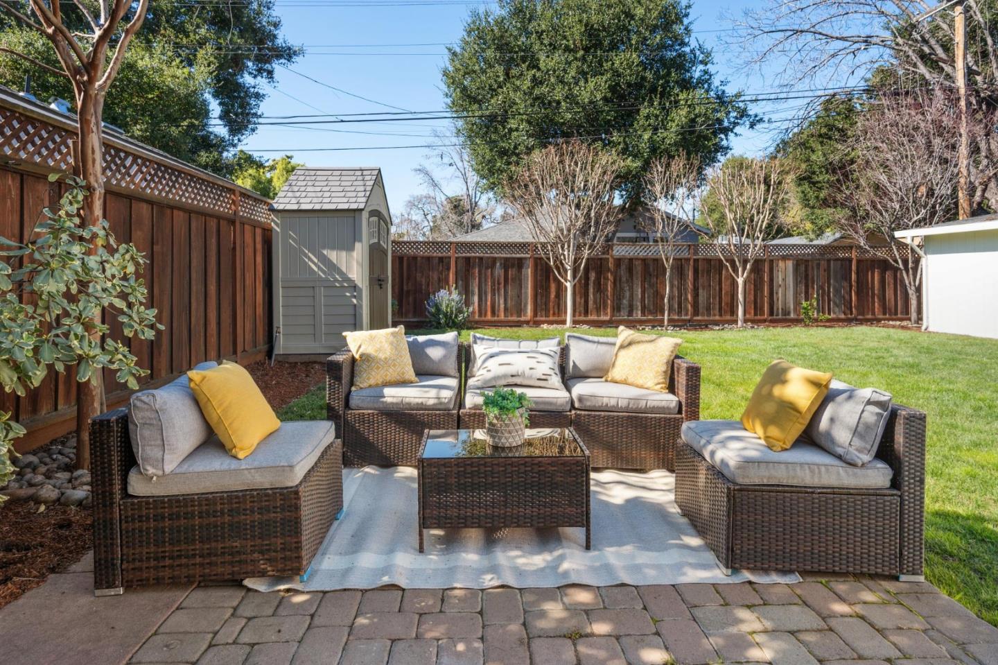 1035 Henderson Avenue Menlo Park, CA 94025 - Photo 27 of 38 a view of a patio with couches chairs and a fire pit
