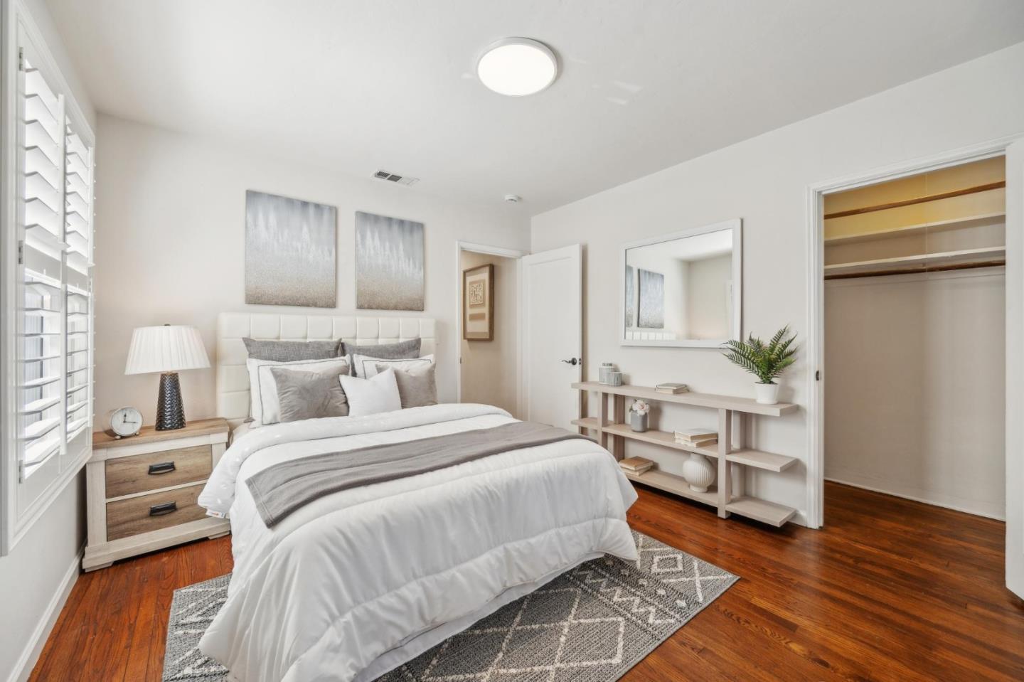 1035 Henderson Avenue Menlo Park, CA 94025 - Photo 4 of 38 a bedroom with a bed and a night stand